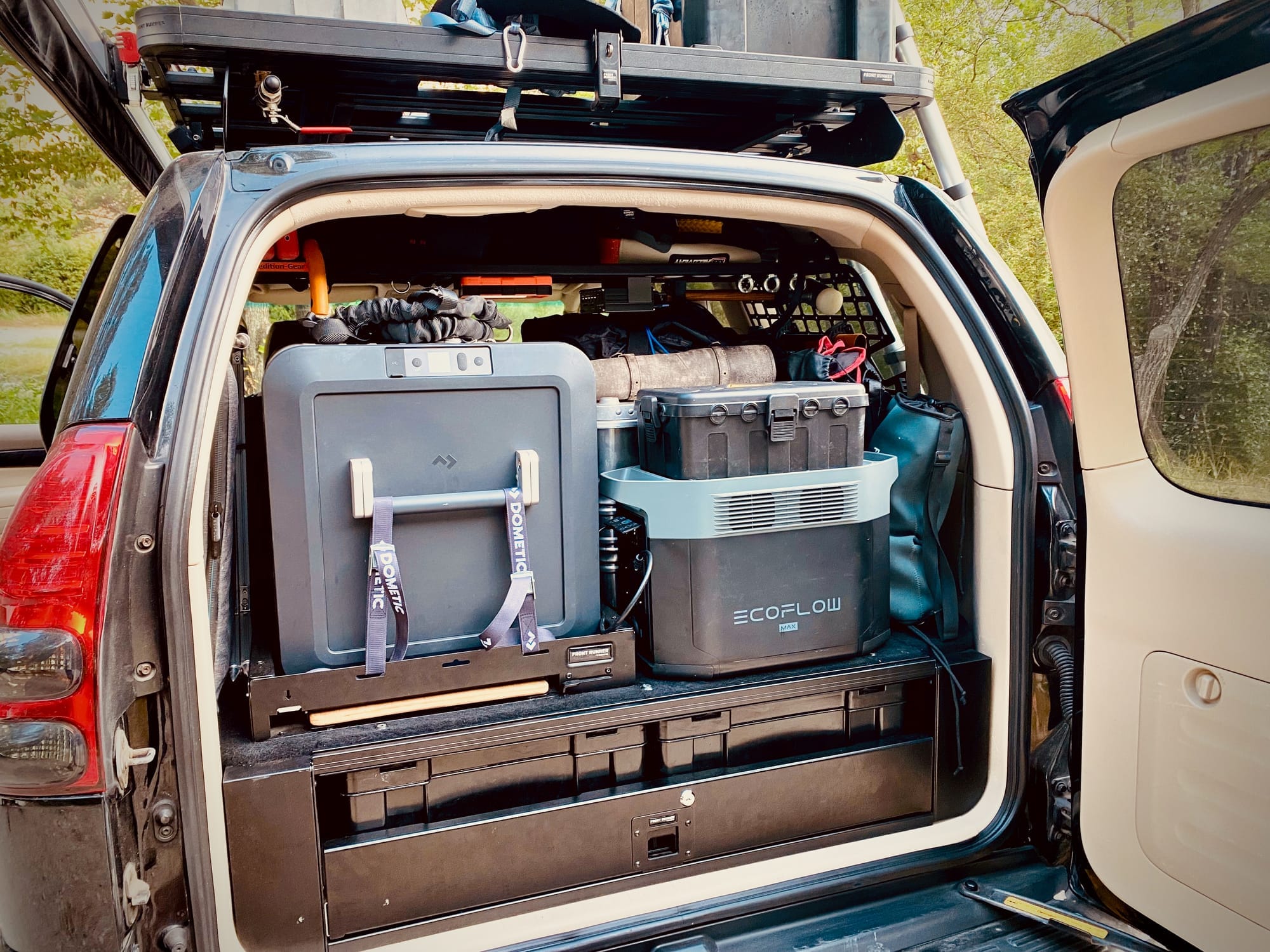Image of the trunk of our car equiped for a camping trip