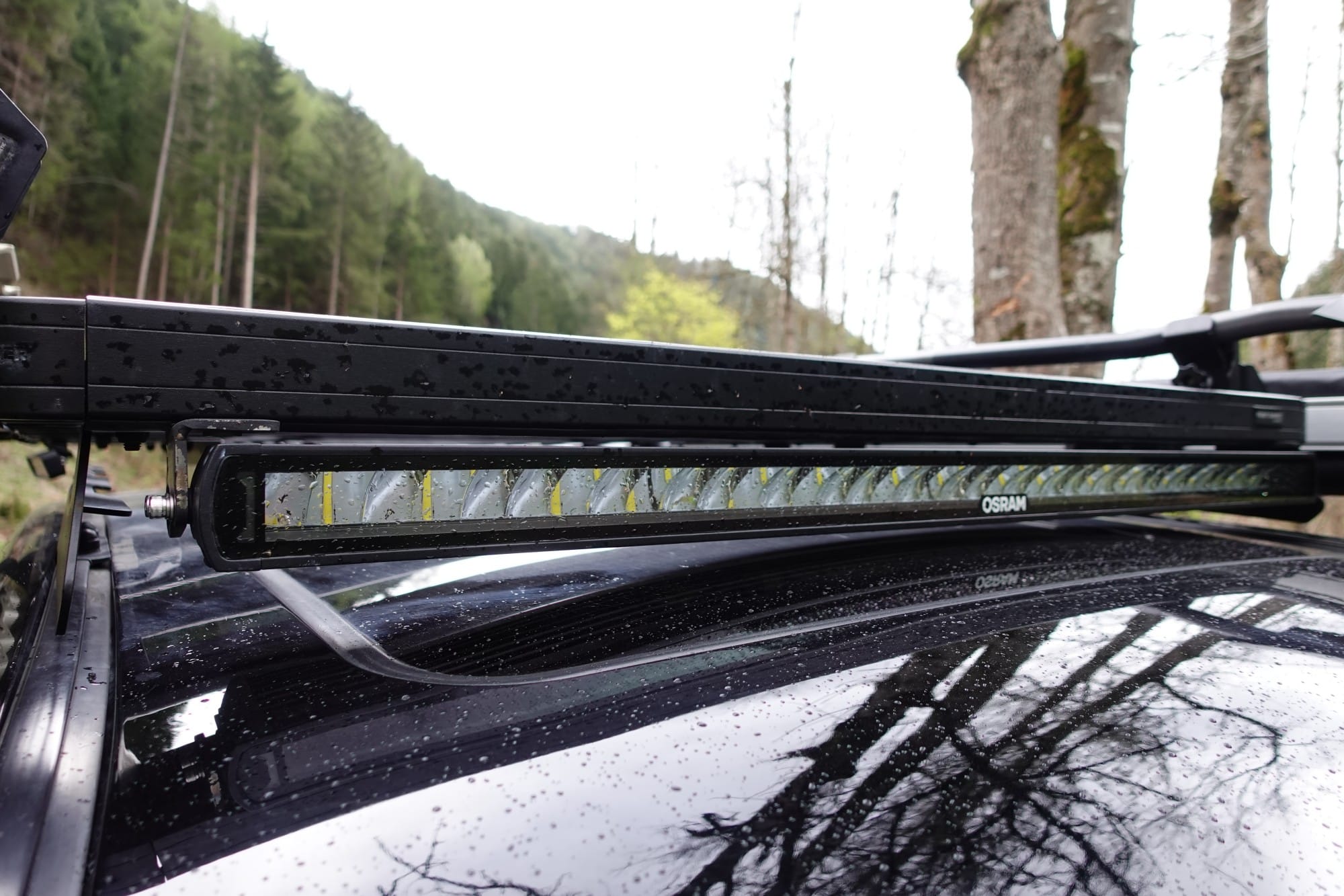 A roof rack with a LED light bar
