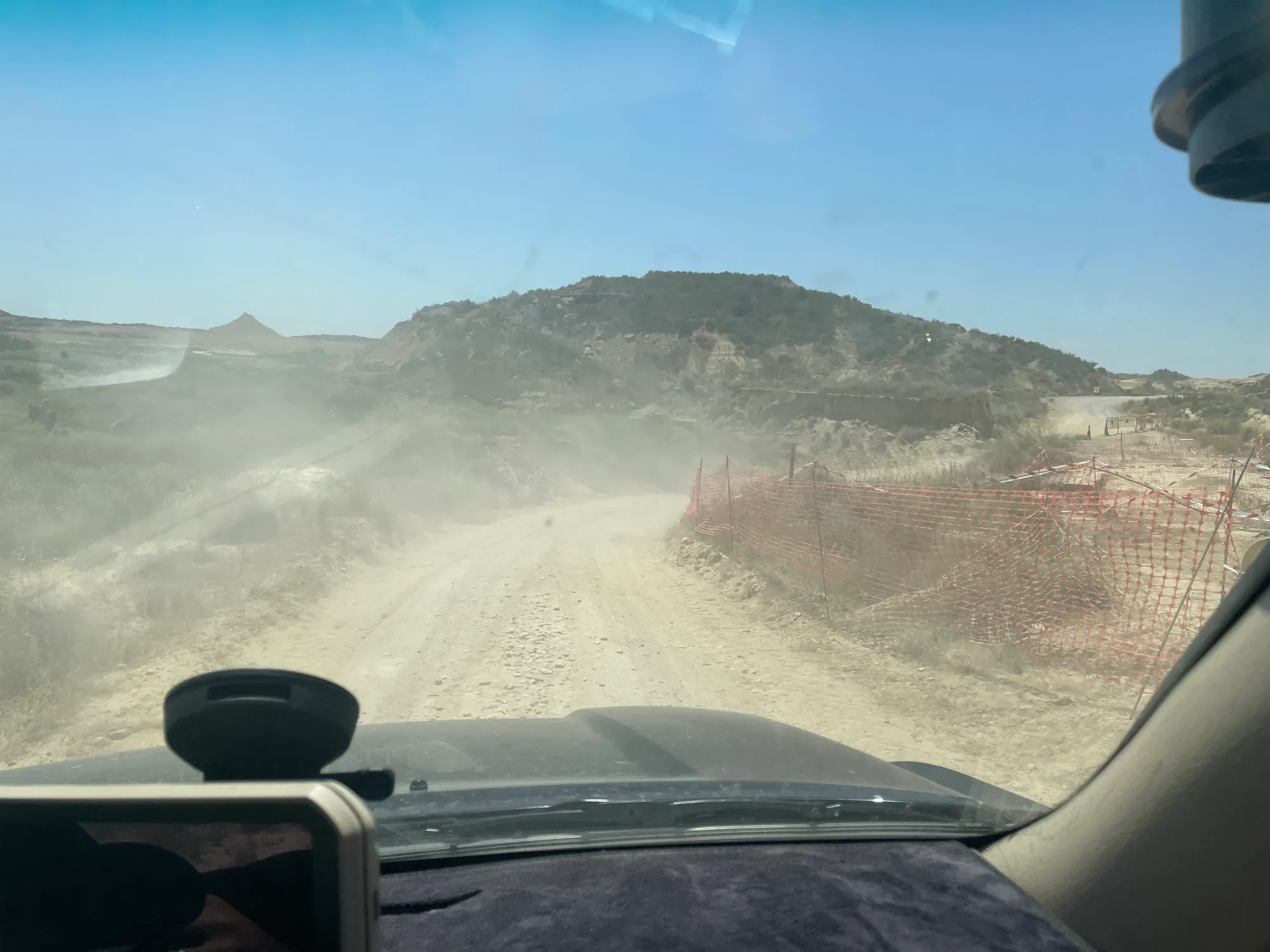 Driving over a dusty road in Spain