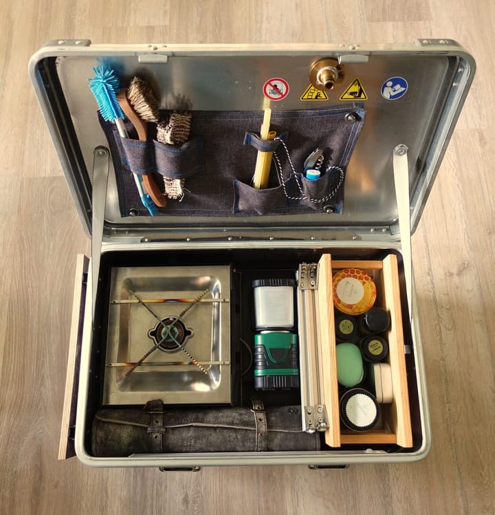 An image of an aluminium box used as portable camping kitchen 